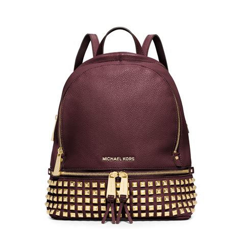 michael kors studded backpack leather|More.